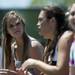 Lexi Pew watches with Greenhills tennis players on Thursday, May 16. Daniel Brenner I AnnArbor.com